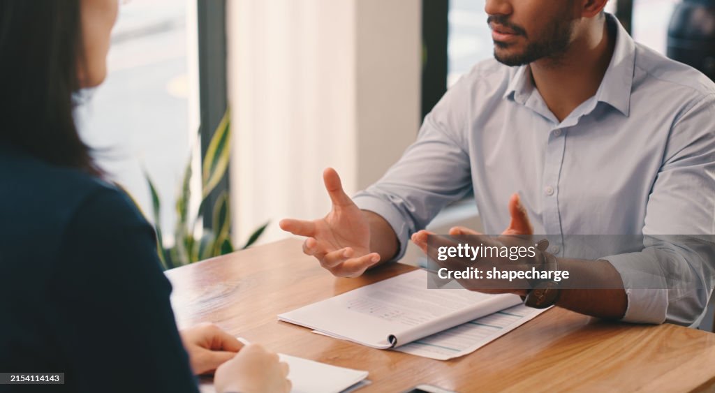 Business people, meeting and documents with discussion for contract, policy or legal agreement at office. Hands of businessman and woman with paperwork for insurance, finance or proposal at workplace