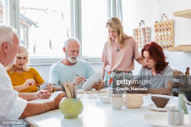 creative seniors - potter stock pictures, royalty-free photos & images