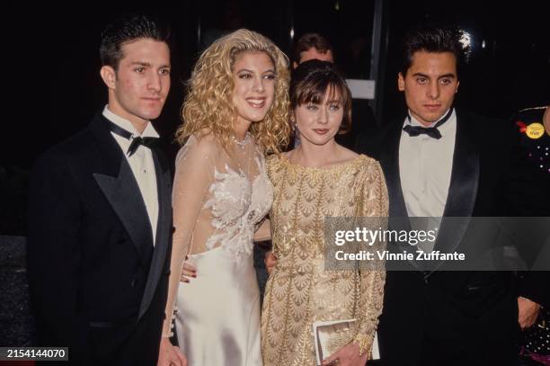 Actresses Tori Spelling, second left with friend, and Shannen Doherty with her boyfriend Chris Foufas, first right, at the 18th People's Choice...