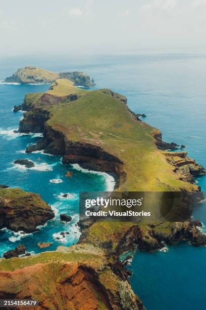 aerial view of majestic greed cliffs surrounded by ocean - funchal stock pictures, royalty-free photos & images