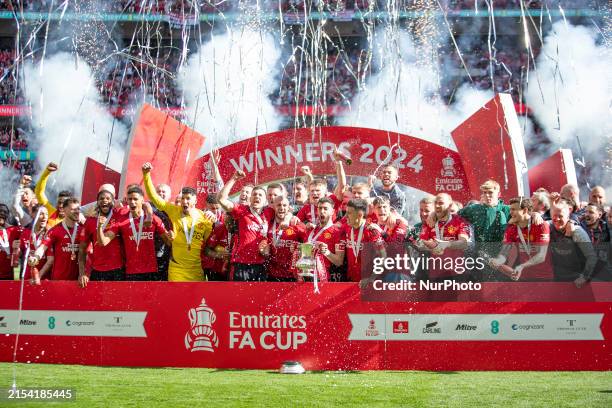 Manchester United players are celebrating winning the FA Cup during the FA Cup Final between Manchester City and Manchester United at Wembley Stadium...