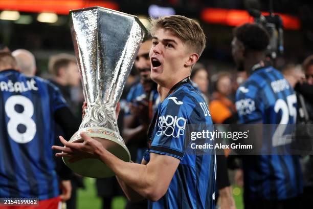Charles De Ketelaere of Atalanta BC celebrates with the UEFA Europa League Trophy after his team's victory during the UEFA Europa League 2023/24...