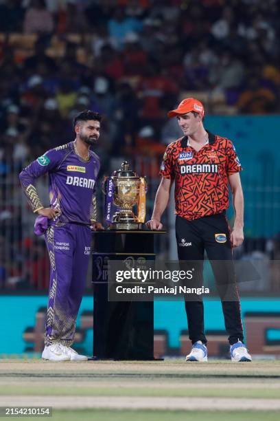 Pat Cummins of Sunrisers Hyderabad and Shreyas Iyer of Kolkata Knight Rider poss with Indian Premier League trophy at the toss during the 2024 IPL...