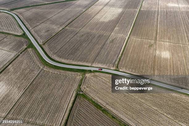 high angle perspective showing plowed fields, piedmont, italy - plowed field stock pictures, royalty-free photos & images