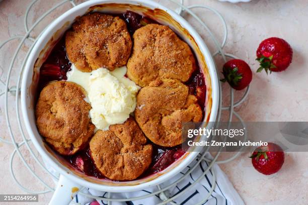 cobbler with rhubarb and strawberries - cobbler dessert stock pictures, royalty-free photos & images