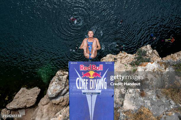 In this handout image provided by Red Bull, Rhiannan Iffland of Australia dives from the 21 metre platform during the final competition day of the...