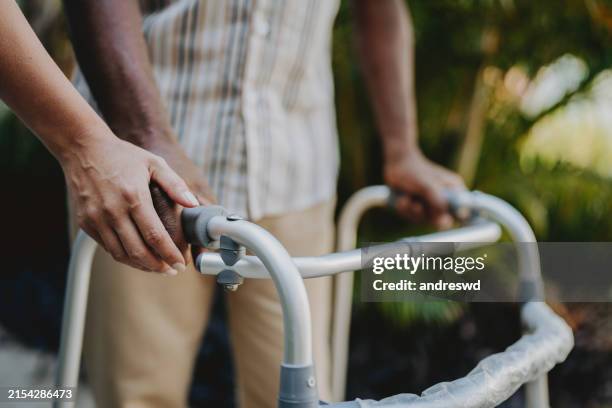 home physiotherapy walker medical equipment - mobility walker stock pictures, royalty-free photos & images