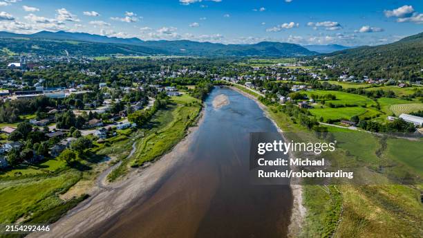 aerial of the gouffre river flowing in the st. lawrence river, quebec, canada, north america - st lawrence river stock pictures, royalty-free photos & images