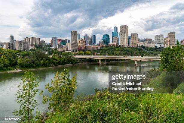 skyline of edmonton over the north saskatchewan river, alberta, canada, north america - saskatchewan river stock pictures, royalty-free photos & images