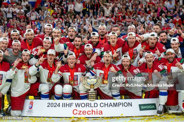 Team Czechia pose with the trophy during the 2024 IIHF Ice Hockey World Championship Czechia Gold Medal Match between Switzerland and Czechia at...