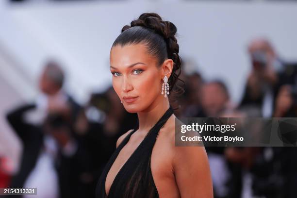 Bella Hadid attends the "L'Amour Ouf" Red Carpet at the 77th annual Cannes Film Festival at Palais des Festivals on May 23, 2024 in Cannes, France.