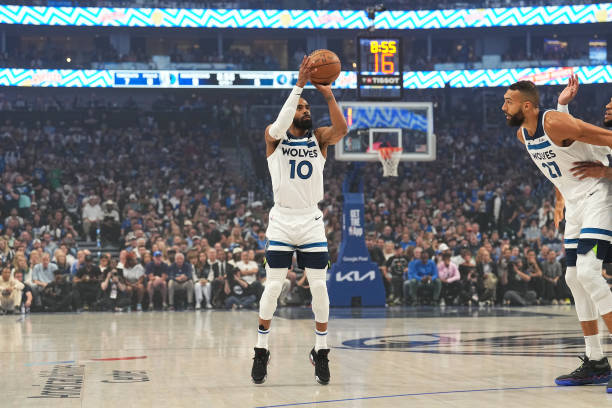 Mike Conley of the Minnesota Timberwolves shoots the ball during the game against the Dallas Mavericks during Game 3 of the Western Conference Finals...