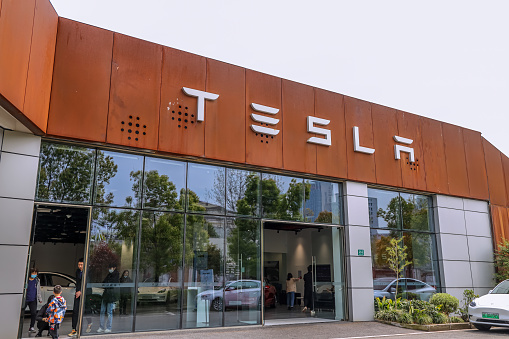 The retail shop of Tesla with customers inside in Pudong, Shanghai, China.