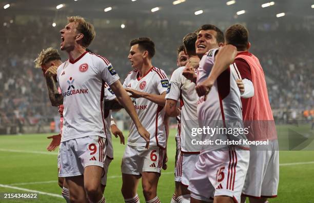 The players of Duesseldorf celebrate their team's second goal during the Bundesliga Playoffs Leg One match between VfL Bochum and Fortuna Düsseldorf...