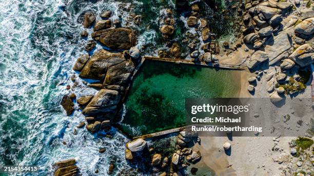 aerial of a rock pool, camps bay, cape town, south africa, africa - camps bay stock pictures, royalty-free photos & images