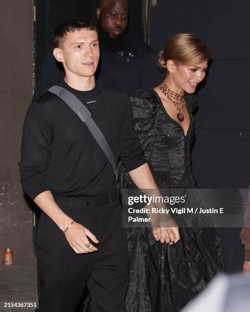 Tom Holland and Zendaya are seen leaving The Duke of York's Theatre after a 'Romeo and Juliet' press night on May 23, 2024 in London, England.