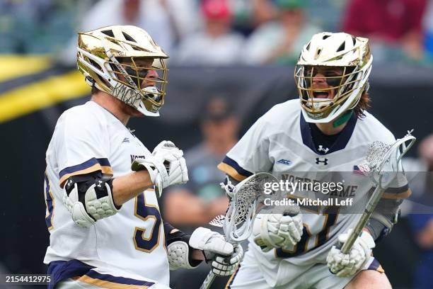Chris Kavanagh of the Notre Dame Fighting Irish celebrates his goal along with Pat Kavanagh against the Maryland Terrapins in the first half of the...