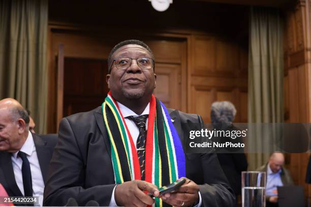 South African Ambassador to the Netherlands Vusimuzi Madonsela and members of the delegation are sitting in the courtroom. The UN top court, the...