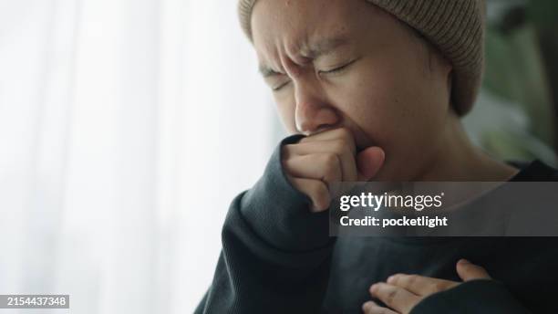 teenager patient coughing and painful chest. - coughing stock pictures, royalty-free photos & images