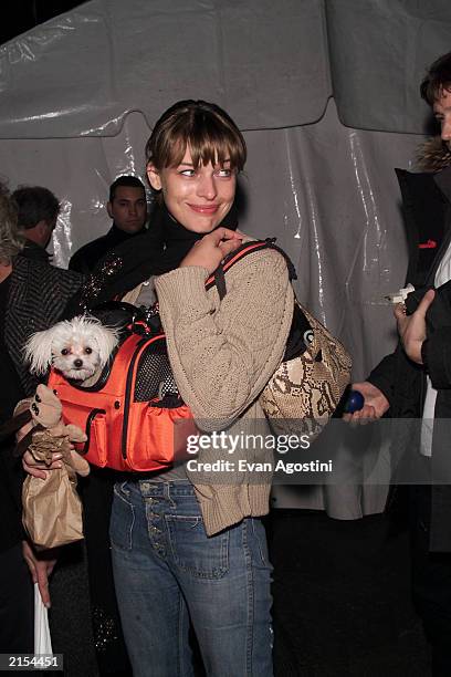 Ukranian born model and actor Milla Jovovich with her pet dog arriving at The New York Post NYPF fashion supplement launch party at the Mercer...