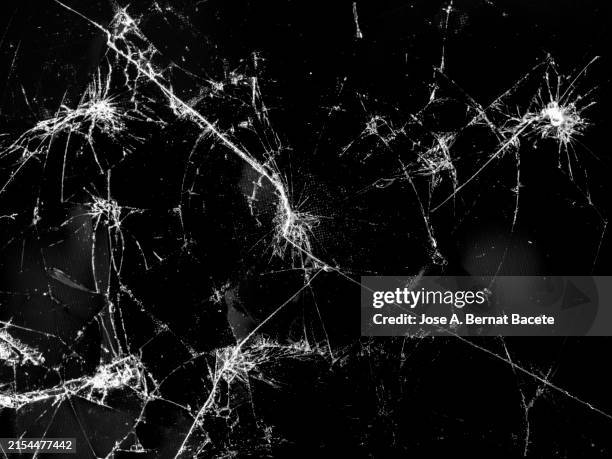 abstract background, broken glass of a smartphone screen due to a fall. - broken drinking glass stock pictures, royalty-free photos & images
