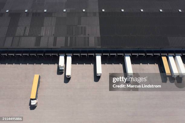 truck arriving at a warehouse - reversing stock pictures, royalty-free photos & images