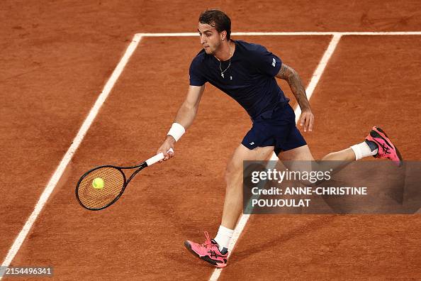 Felipe Tenius Brazil's Felipe Meligeni Alves plays a forehand return to Norway's ...