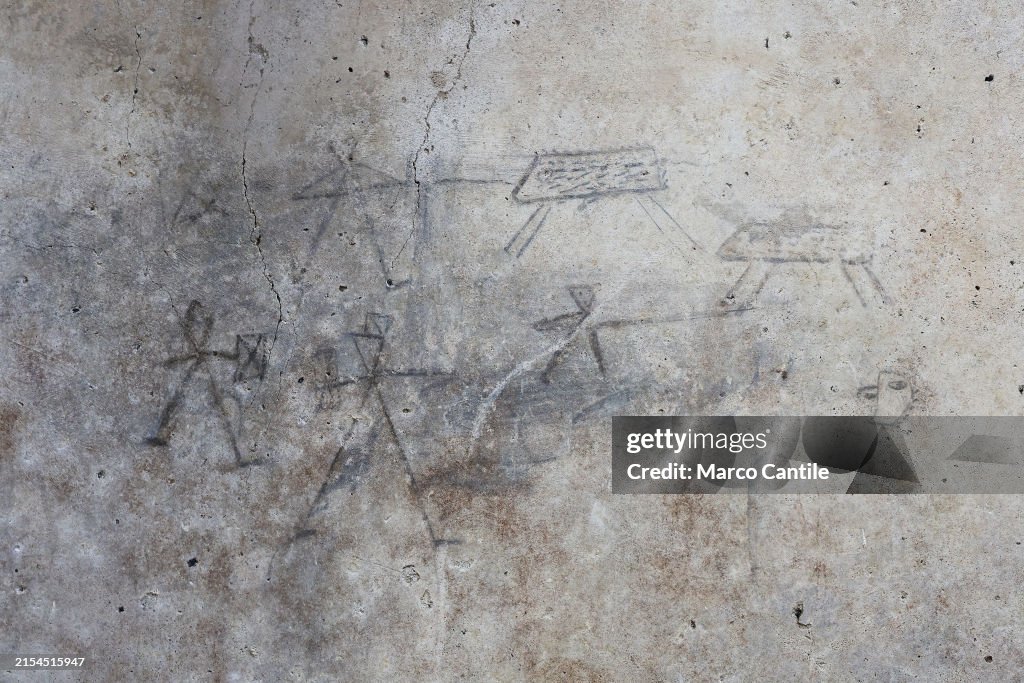 A gladiators drawing, probably made by a child with charcoal...