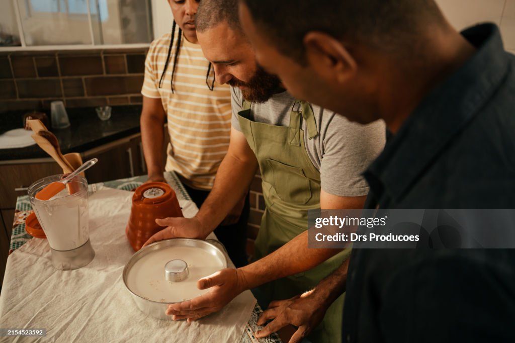 Man cooking with friends
