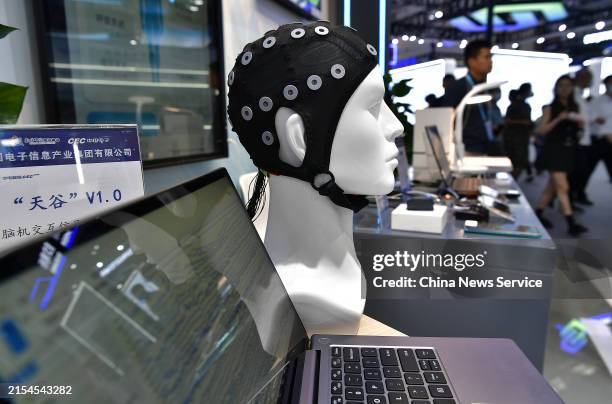 Brain-computer interface signal acquisition system is on display at the on-site experience area for the 7th Digital China Summit on May 24, 2024 in...