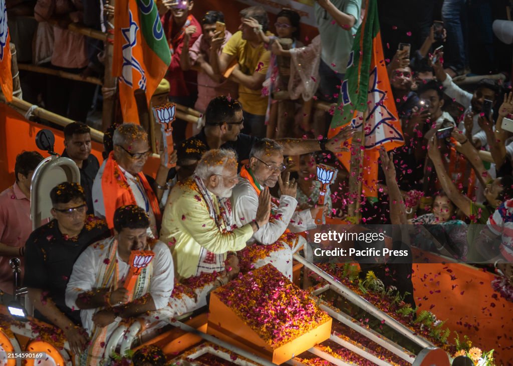 India's Prime Minister Narendra Modi in his first ever road...