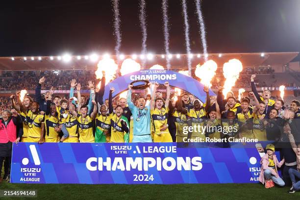 The Mariners celebrate with the trophy after victory during the A-League Men Grand Final match between Central Coast Mariners and Melbourne Victory...