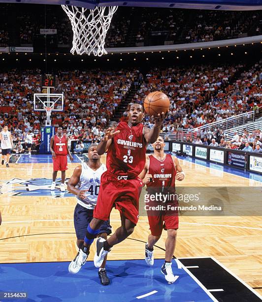 LeBron James of the Cleveland Cavaliers takes the ball up during the 2003 Pro Summer League game against the Orlando Magic at TD Waterhouse Centre on...