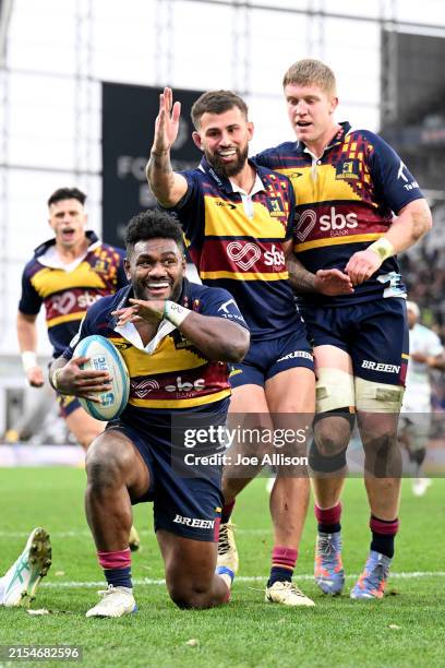 Timoci Tavatavanawai of the Highlanders celebrates after scoring a try during the round 14 Super Rugby Pacific match between Highlanders and Fijian...