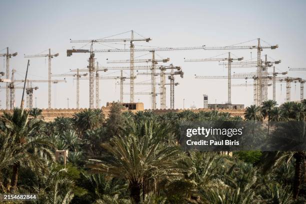 tower cranes at construction site renovation program, development, concept of the buildings industry. ad diriyah, at-turaif district, riyadh, saudi arabia - gulf countries stock pictures, royalty-free photos & images