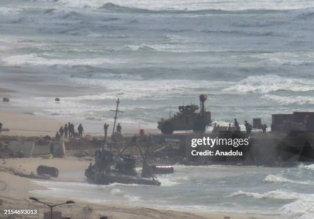 View damaged floating pier, set up by US to facilitate quicker delivery of humanitarian aid to Palestinians, after it has been suspended due to...