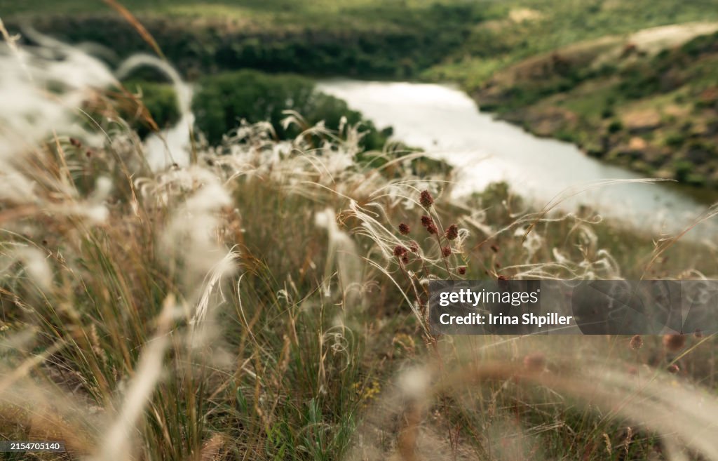 Beautiful natural scenery of river in Ukraine with rocks in background, top view. Summer time.