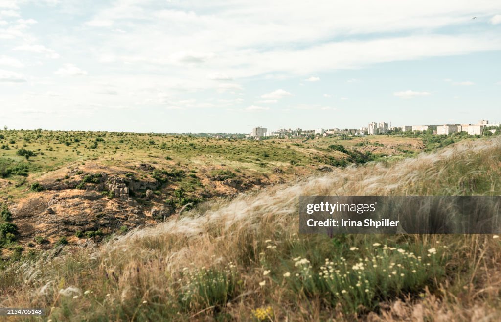 Beautiful natural scenery of river in Ukraine with rocks in background, top view. Summer time.