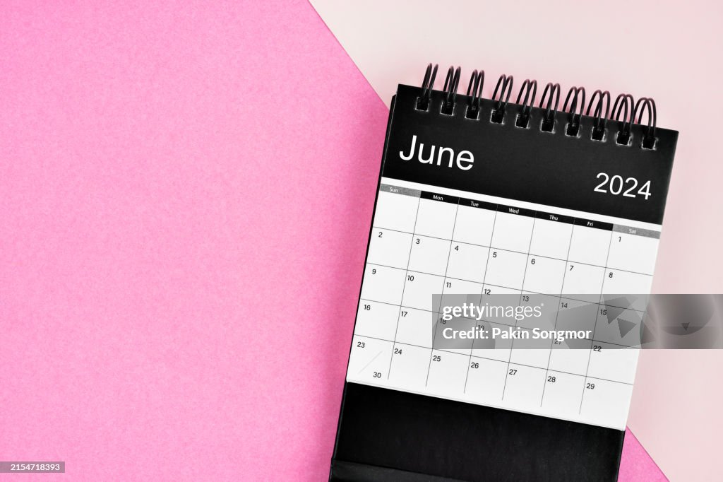 June desk calendar for 2024 year on pink two tone color background, Position with copy space.