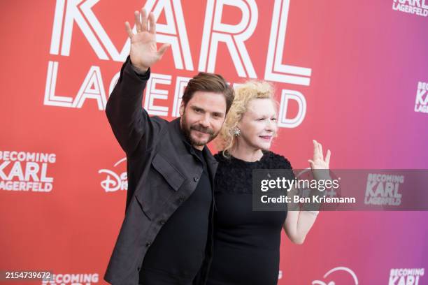 Daniel Bruehl and Sunnyi Melles attend the "Becoming Karl Lagerfeld" premiere at Zoo Palast on May 30, 2024 in Berlin, Germany.
