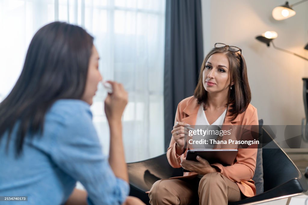 A therapist and client engage in a meaningful conversation
