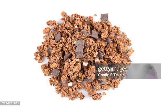 macro close up of chocolate muesli with pieces of chocolate - granola stock pictures, royalty-free photos & images