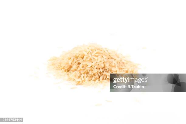 Piled Up Rice Pile Of Brown Rice Isolated On A White Background High-Res Stock Photo ...