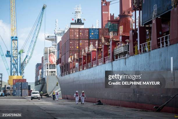 Container ship Port Vila Chief waits to be unloaded at the Autonomous Port of Noumea in France's Pacific territory of New Caledonia on May 31, 2024....