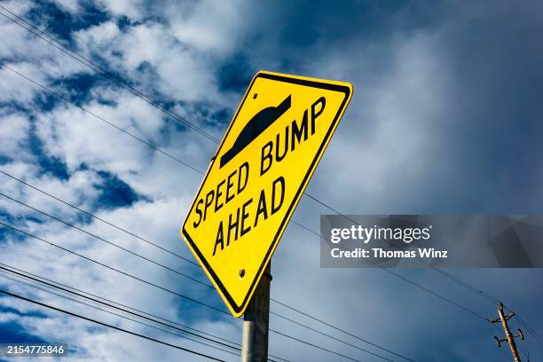 135 Caution Speed Bump Sign Stock Photos, High-Res Pictures, and Images ...