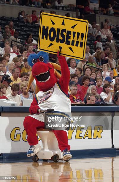 Freddy of the Indiana Fever holds a "Noise!!!" sign during the WNBA game against the Detroit Shock at Conseco Fieldhouse on July 6, 2003 in...