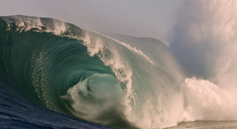 https://media.gettyimages.com/id/2154798682/video/close-up-of-extremely-powerful-blue-wave-breaking-in-the-open-ocean-over-a-shallow-reef-ledge.jpg?b=1&s=640x640&k=20&c=3J1mrXL1IhNRAlq6SP_dGGbF3Ud6mNttRG3TWmF59GE=