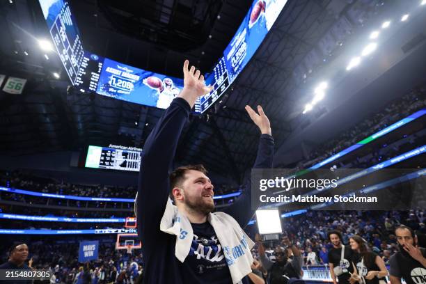 Luka Doncic of the Dallas Mavericks waves to the crowd following the victory against the Minnesota Timberwolves in Game Three of the Western...