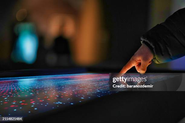 finger touching interactive digital display - user experience stock pictures, royalty-free photos & images