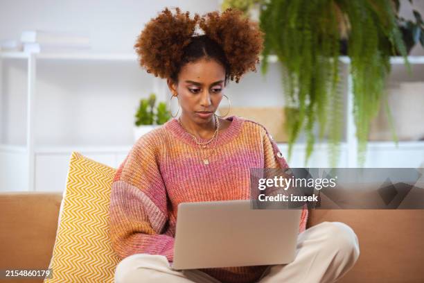 gen z young woman working at home - generation z laptop stock pictures, royalty-free photos & images